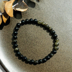 Guld obsidian armbånd