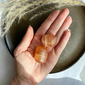 Honning calcit lommesten